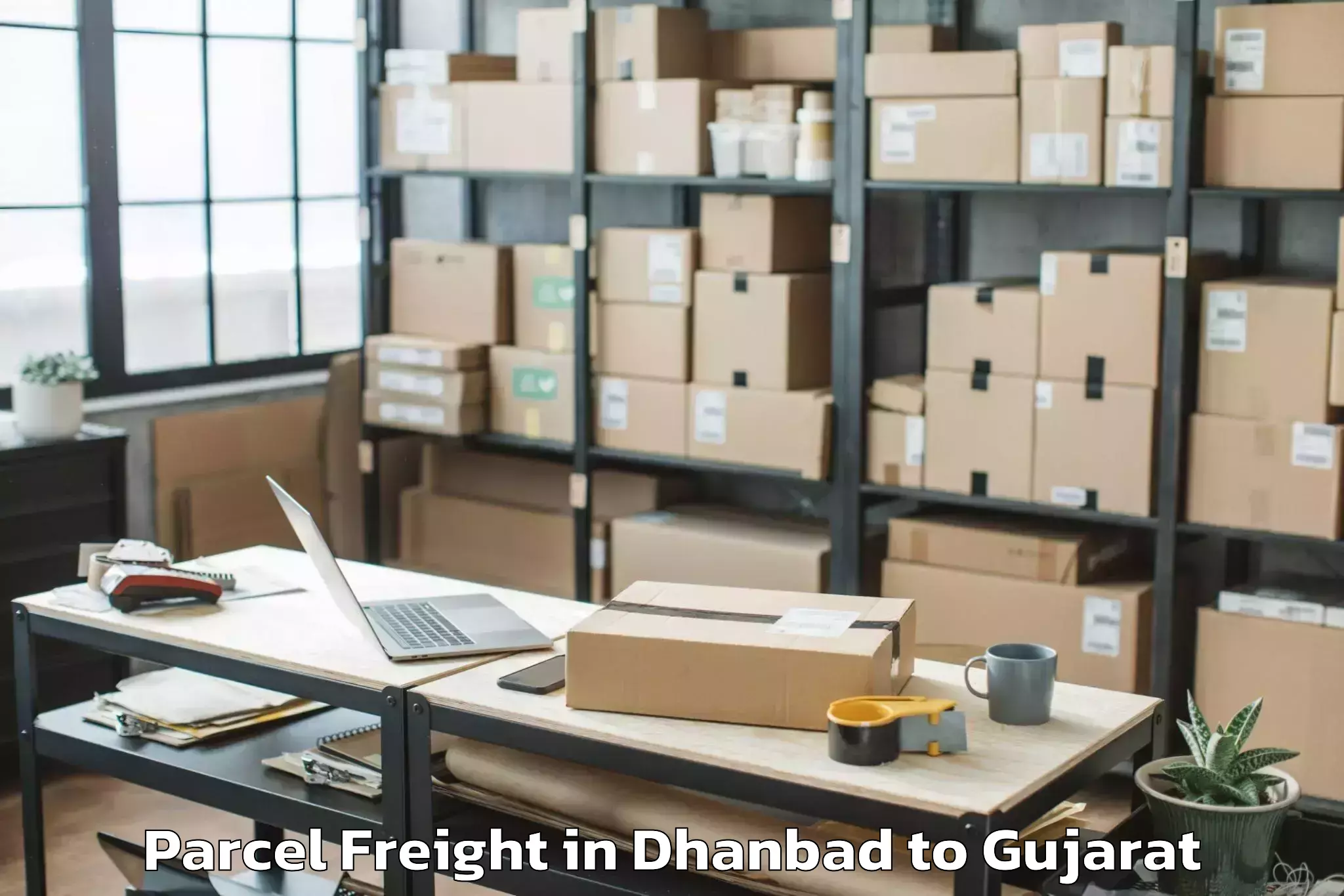 Hassle-Free Dhanbad to Junagadh Agricultural Universi Parcel Freight